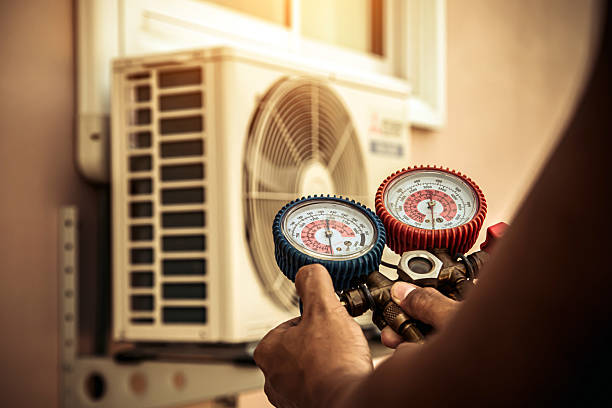 Professional Air Conditioning Service technician working in Cape May, NJ